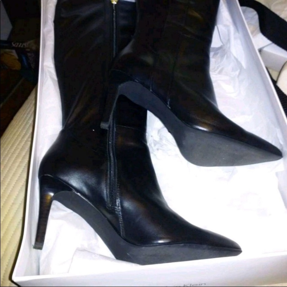 Black leather Calvin Klein boots